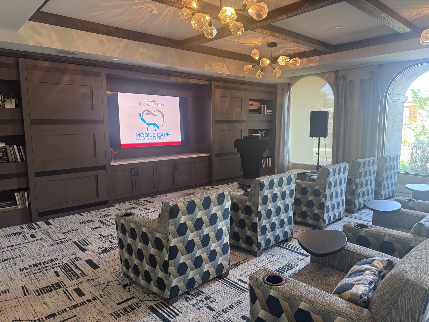 Dr. Koo Karimi presenting a Dental Board–approved CE course
